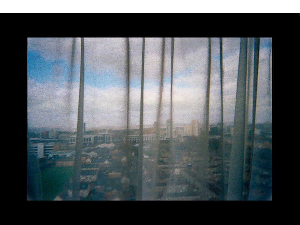 <i><b>Image:</b></i> a resident's view from <i>Different Storeys</i>, a participatory photography project produced by Anna Heinrich & Leon Palmer with Residents of Loudoun House and Nelson House, Butetown, Cardiff, 2012 © Heinrich & Palmer and CCHA