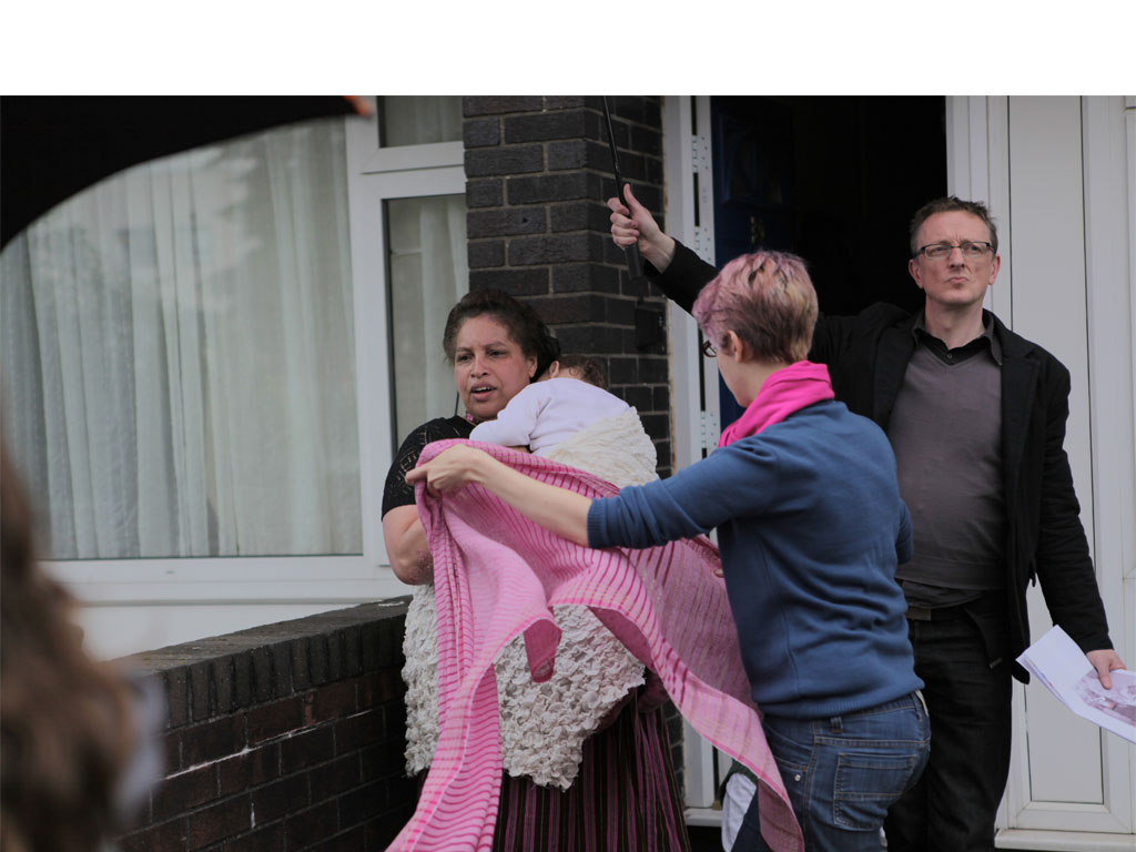 <i><b>Image:</b></i> <i>Statues</i>, a participatory film project produced by Janet Hodgson with Butetown Residents @Loudoun Square, Butetown, Cardiff, 2012.  Photograph by Victoria Rodway © CCHA