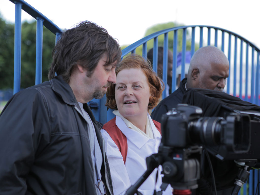 <i><b>Image:</b></i> <i>Statues</i>, a participatory film project produced by Janet Hodgson with Butetown Residents @Loudoun Square, Butetown, Cardiff, 2012.  Photograph by Victoria Rodway © CCHA